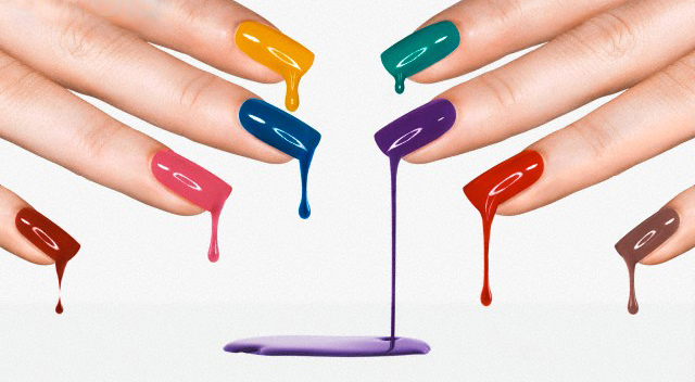 multicolor nail polish --- Image by © Fendis/Corbis